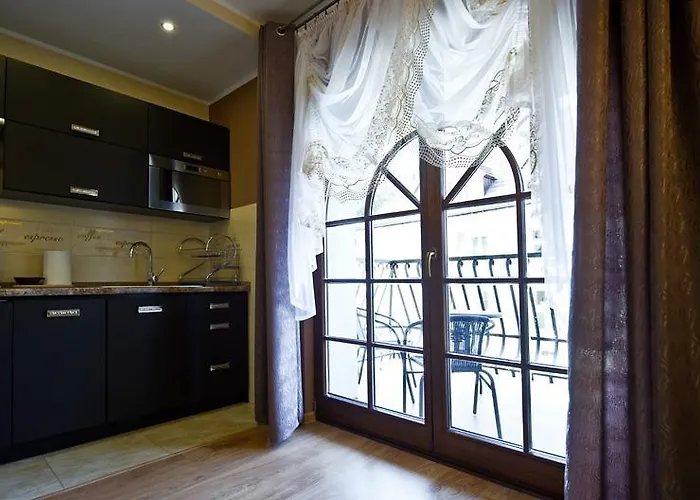 Apartamenty-plaza アパート